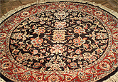 Signature
   Persian Kashan round rug