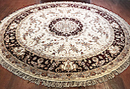 8' Round Tabriz Silk & Wool rug