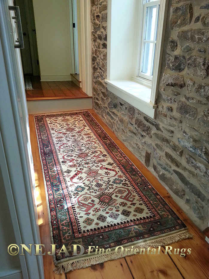 Peperdil rug runner provides an excellent counterpoint to natural wood floor