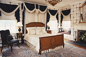 Room size rug in bedroom