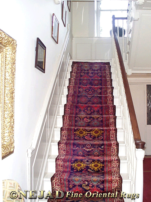 Nejad Runner installed on wooden staircase in Bucks County historic estate featured in Architectural Digest.