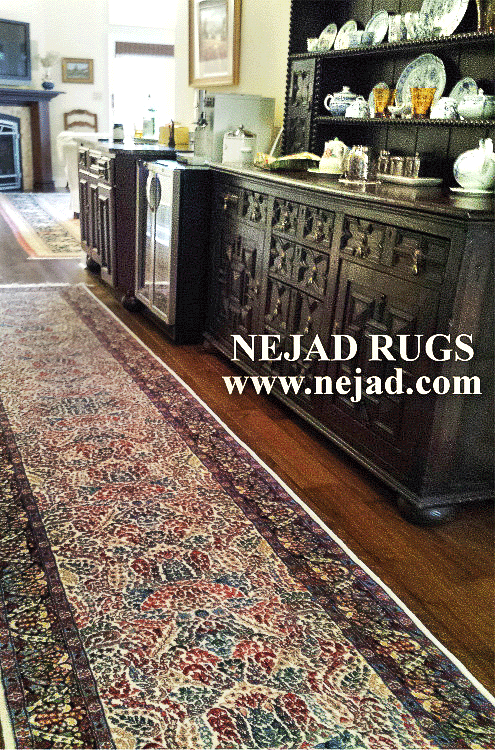 This interior features a colorful handmade Persian Kerman rug runner
