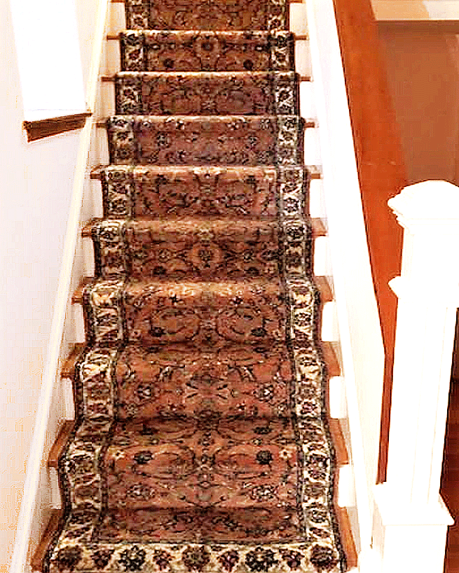 Runners installed on wooden staircase in Society Hill, Philadelphia.